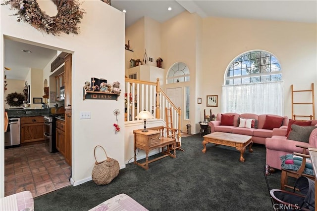 living room featuring beam ceiling, dark colored carpet, and high vaulted ceiling