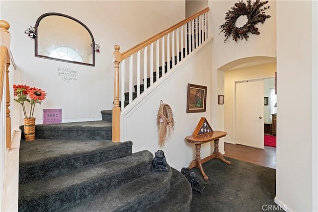 stairs with a towering ceiling