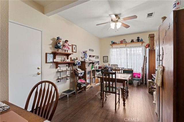 dining room with dark hardwood / wood-style flooring and ceiling fan