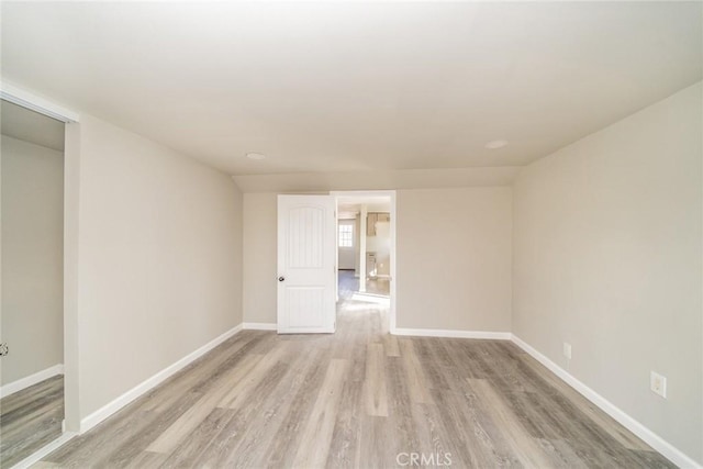 unfurnished room featuring light wood-type flooring