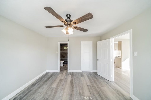 unfurnished bedroom with a closet, ceiling fan, and light hardwood / wood-style flooring