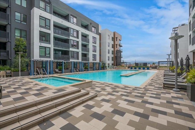 view of swimming pool featuring a patio