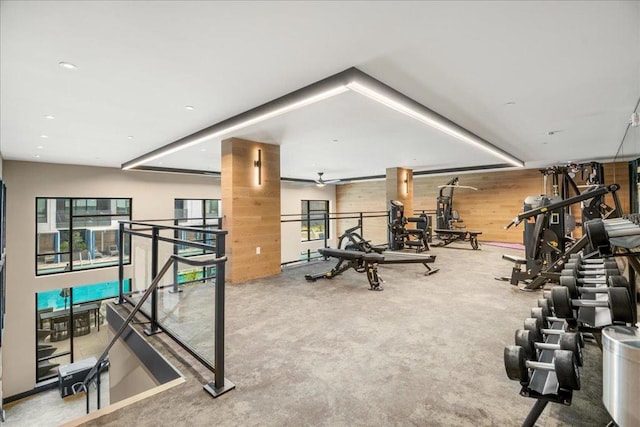 workout area with wood walls