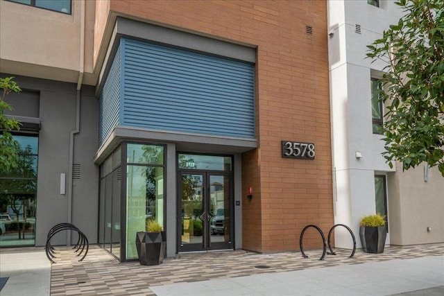 entrance to property featuring french doors