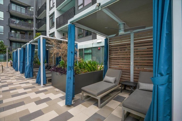 view of patio with ceiling fan