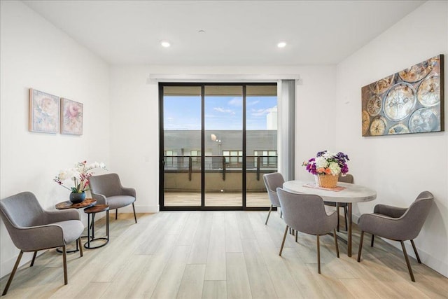 dining space featuring light hardwood / wood-style flooring