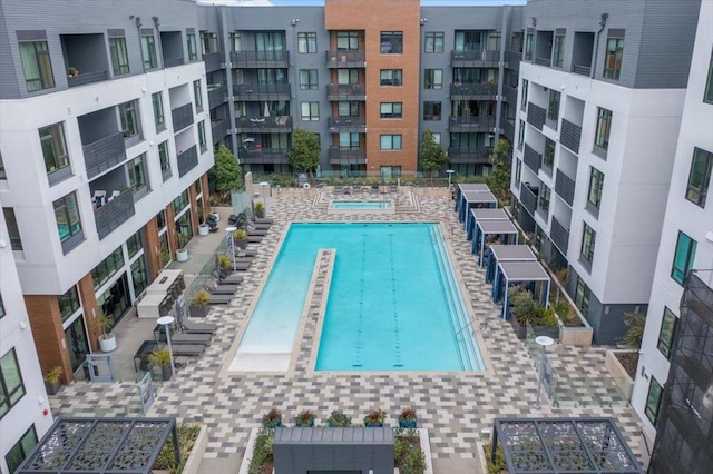 view of swimming pool with a patio area