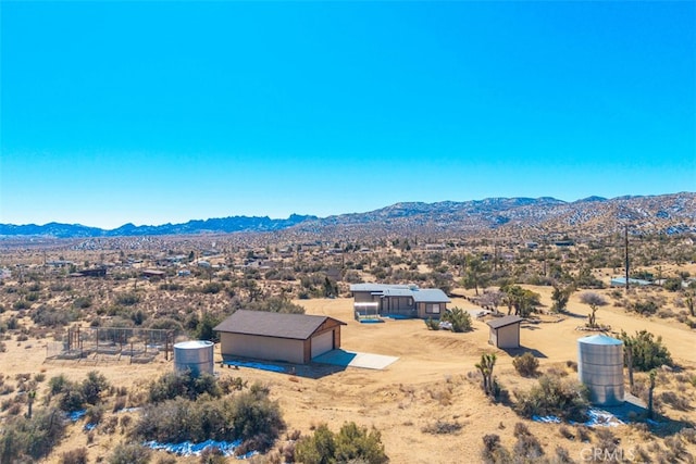 drone / aerial view featuring a mountain view