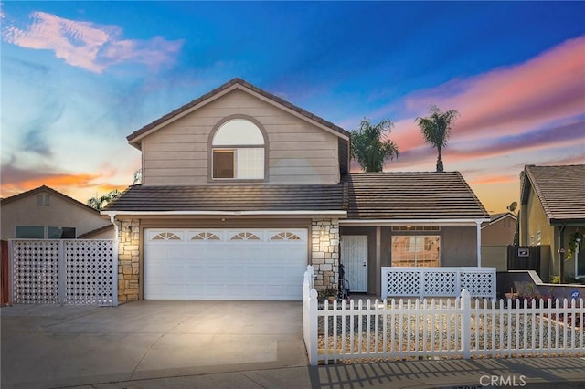 view of front of home featuring a garage