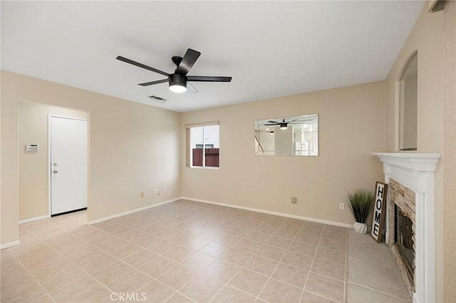 unfurnished living room featuring ceiling fan