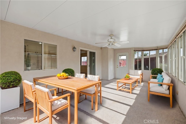 sunroom / solarium with ceiling fan