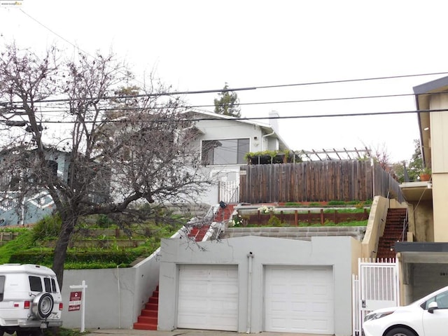 view of front of home with a garage