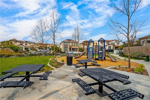 view of playground with a yard