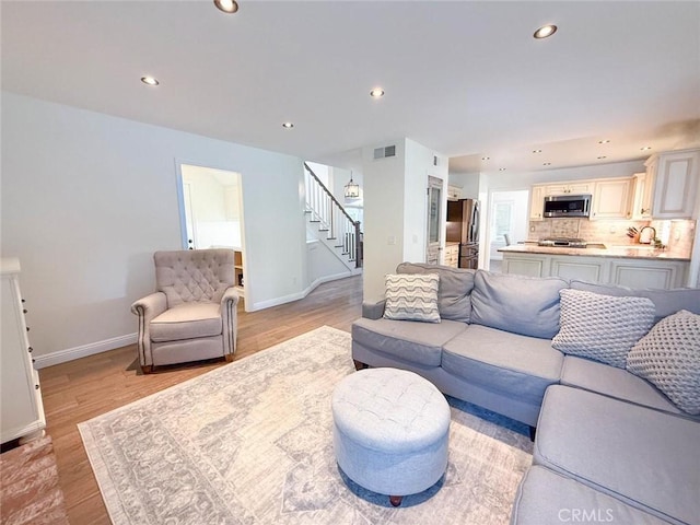 living room with light wood-type flooring