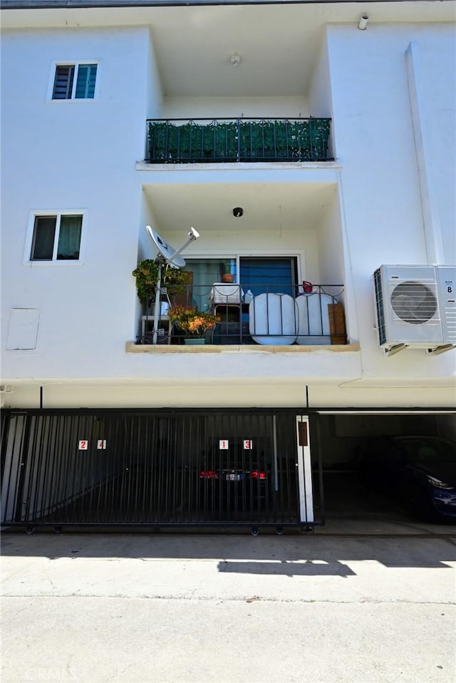 view of building exterior with ac unit