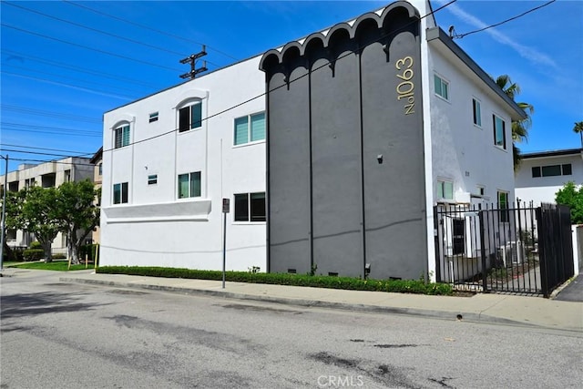 view of building exterior with central AC