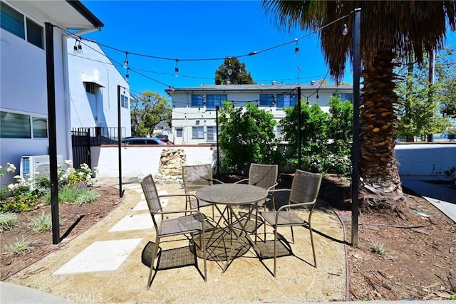 view of patio / terrace featuring ac unit