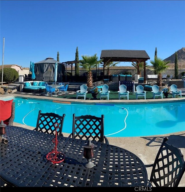 view of pool with a gazebo