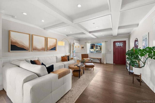 living room featuring coffered ceiling, beam ceiling, dark wood-type flooring, and crown molding