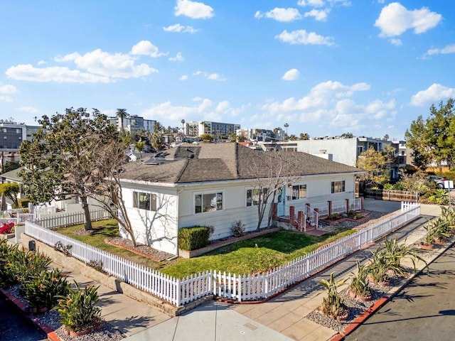 view of front of home with a front lawn