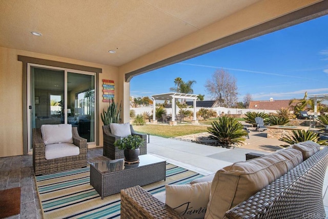 view of patio / terrace featuring an outdoor living space and a pergola