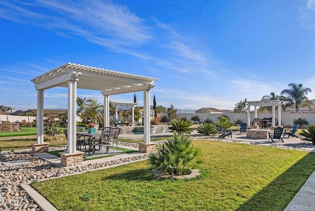 view of yard featuring a fire pit, a pergola, and a patio