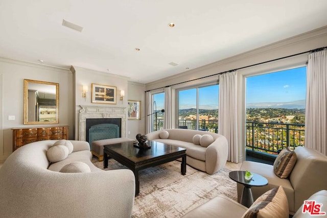 living room with ornamental molding and a mountain view