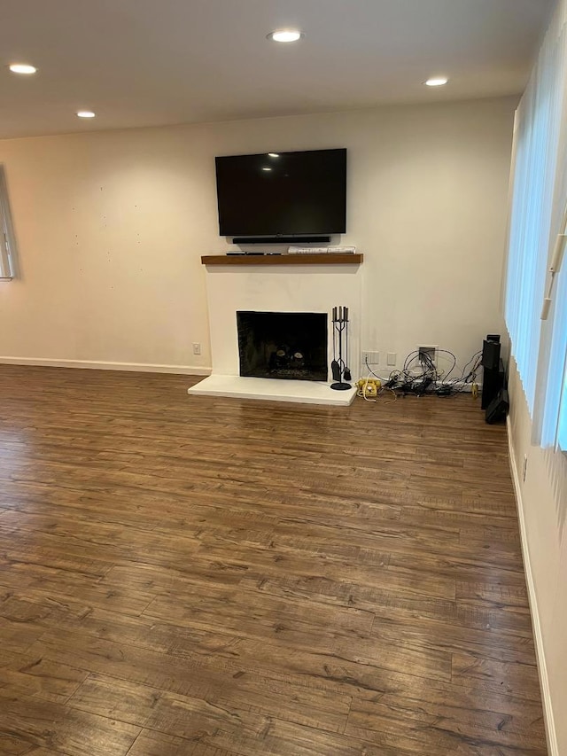 living room with dark hardwood / wood-style floors