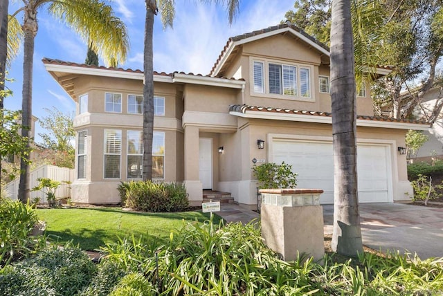 view of front of house featuring a garage and a front lawn