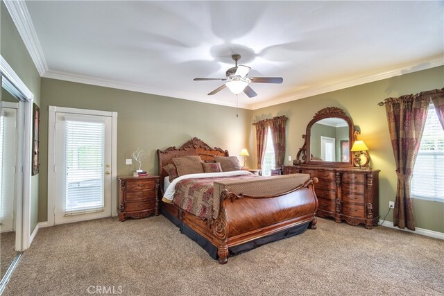 bedroom with crown molding, carpet flooring, access to exterior, and ceiling fan