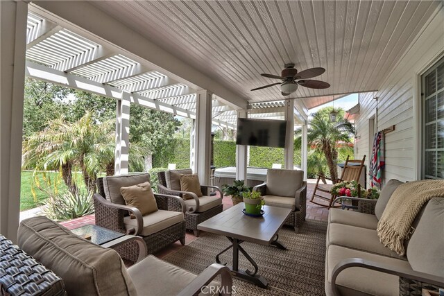 view of patio / terrace featuring ceiling fan, an outdoor hangout area, and a pergola