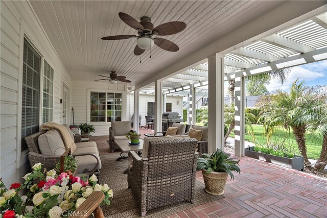 view of patio featuring ceiling fan, a grill, an outdoor hangout area, and a pergola