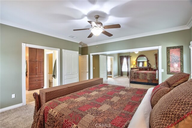 carpeted bedroom with crown molding and ceiling fan