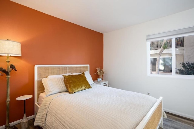 bedroom featuring hardwood / wood-style floors