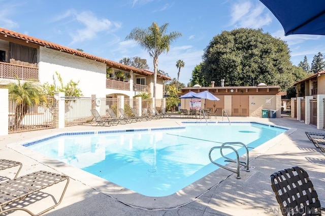 view of swimming pool featuring a patio