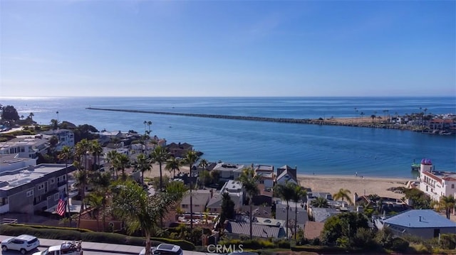 bird's eye view featuring a water view and a view of the beach