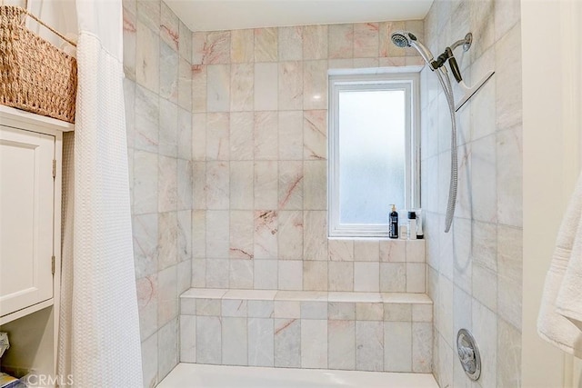 bathroom with a shower with curtain