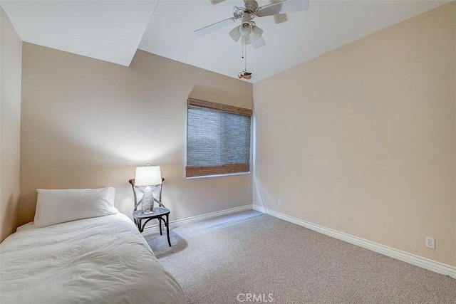 unfurnished bedroom featuring ceiling fan and carpet