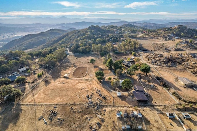 birds eye view of property with a mountain view