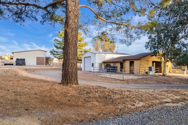 view of front of home with an outbuilding