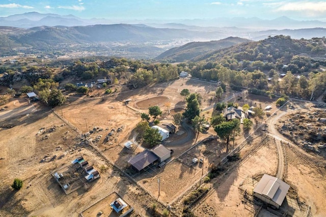 birds eye view of property featuring a mountain view