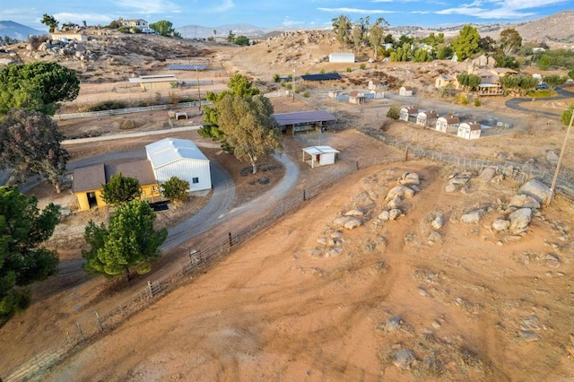 drone / aerial view featuring a mountain view