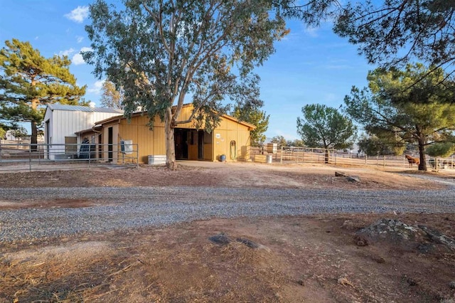 exterior space featuring an outbuilding