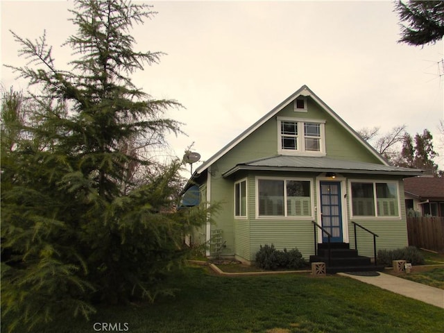 view of front of house with a front lawn