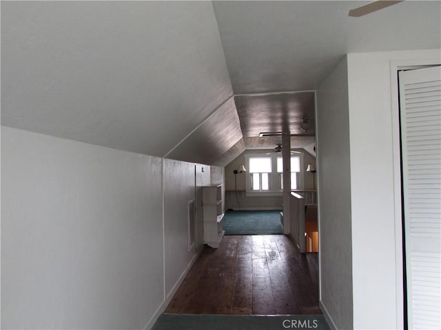 bonus room featuring lofted ceiling, dark wood-type flooring, and ceiling fan