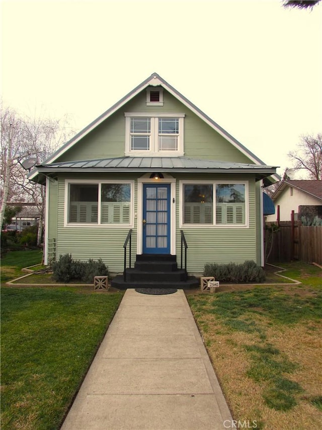 bungalow with a front lawn