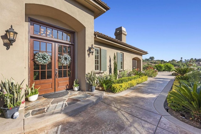 view of exterior entry with french doors