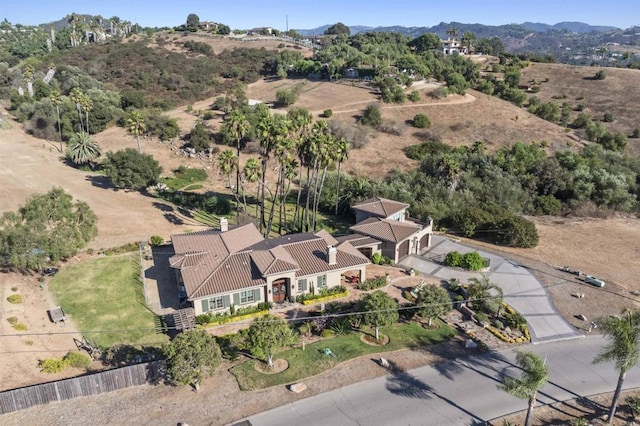 drone / aerial view featuring a mountain view