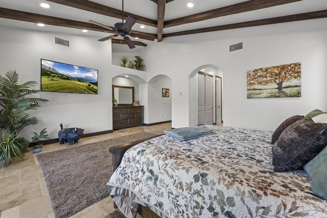 bedroom featuring beam ceiling