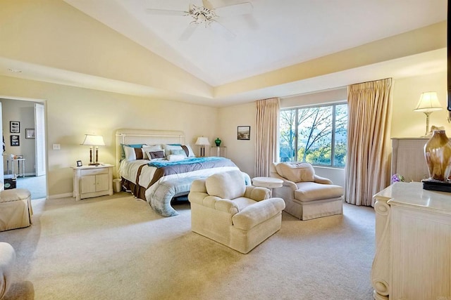 carpeted bedroom with vaulted ceiling and ceiling fan